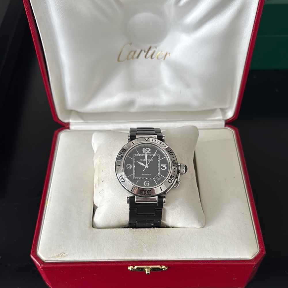 Cartier Black Dial Watch with Silver Bezel